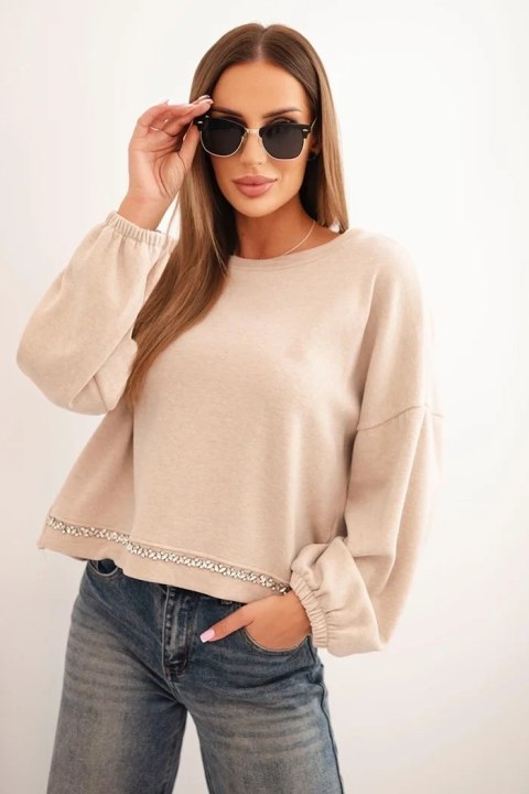 Bluza damska z ozdobnym wykończeniem na dole beżowa