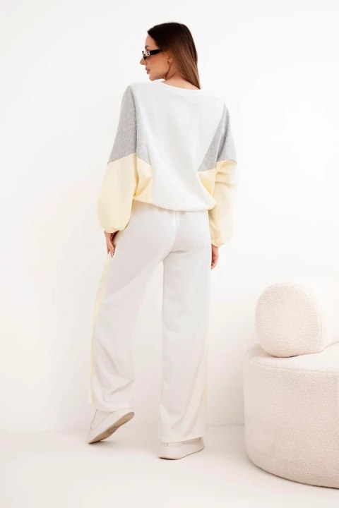 Komplet damski masełko z luźną bluzą i spodniami z szeroką nogawką żółty