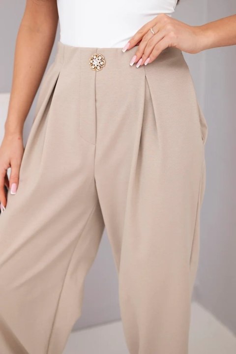 Spodnie damskie bawełniane z wysokim stanem i ozdobnym guzikiem beżowe