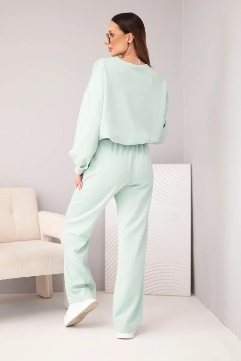 Komplet damski masełko bluza z broszką i spodnie z prostą nogawką ciemny miętowy