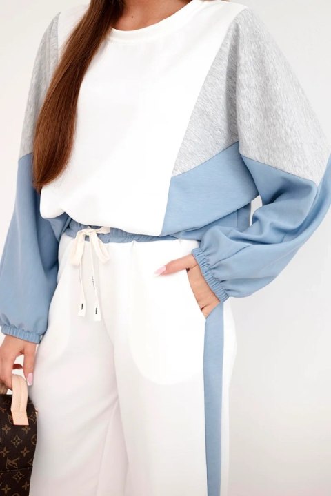 Komplet damski masełko z luźną bluzą i spodniami z szeroką nogawką jeansowy