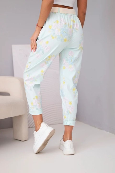 Spodnie damskie wiskozowe w kwiaty z paskiem miętowe