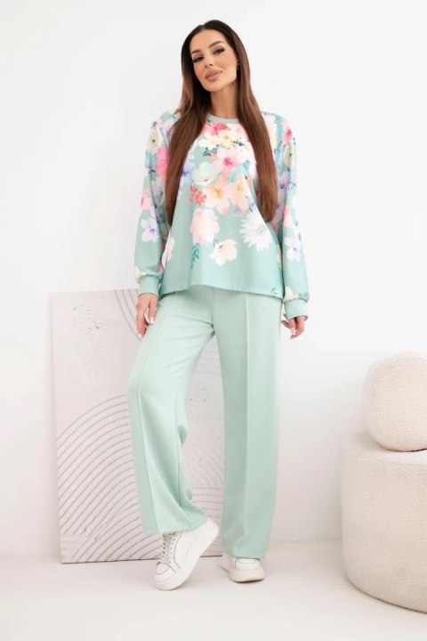 Komplet damski masełkowy wiskozowy w kwiaty z szeroką nogawką ciemno miętowy