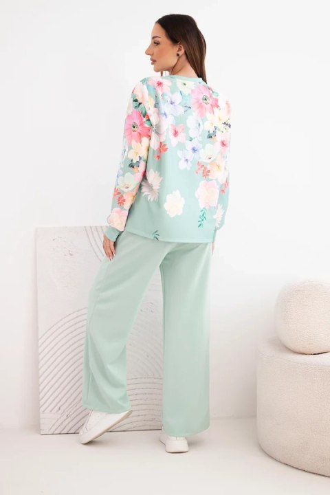 Komplet damski masełkowy wiskozowy w kwiaty z szeroką nogawką ciemno miętowy