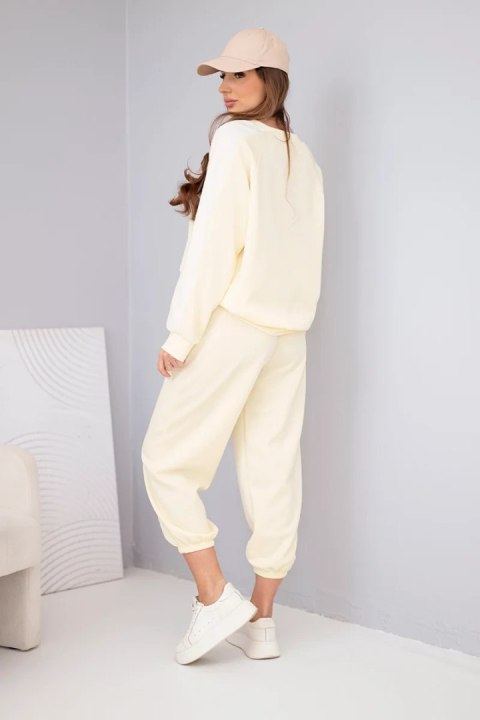 Komplet damski masełkowy z lampasem i ściągaczem żółty