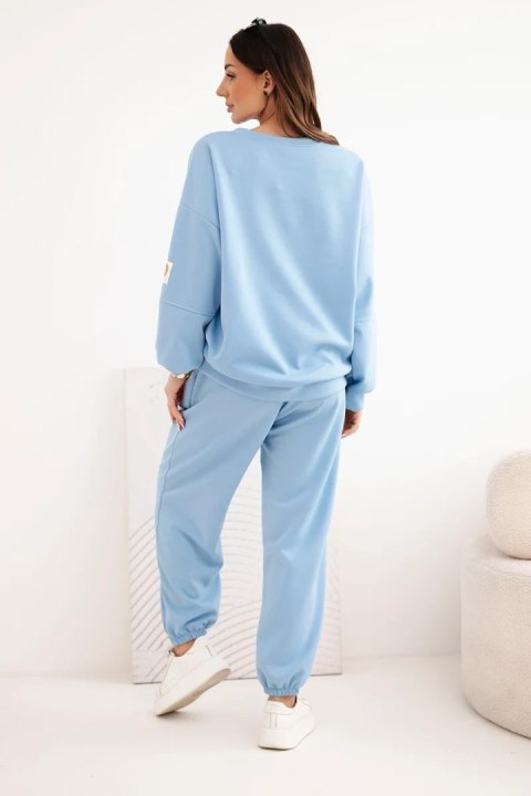 Komplet damski masełkowy z luźną bluzą i spodniami z napisem LOVE niebieski