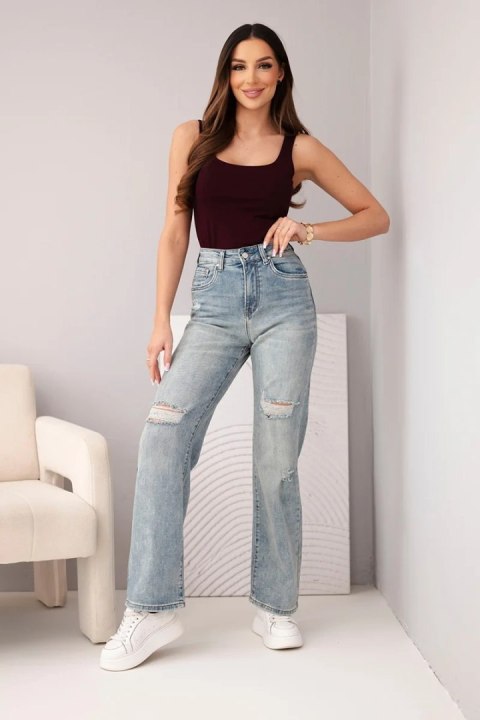 Spodnie damskie z szeroką nogawką i przetarciami jeansowe