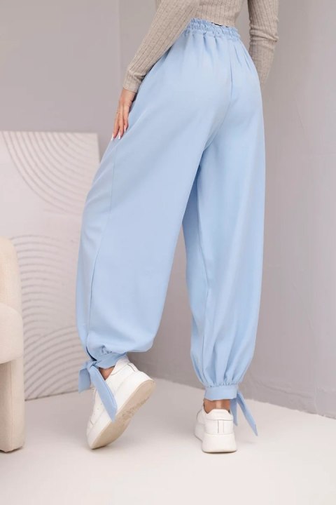 Spodnie damskie z szeroką nogawką i wiązaniem u dołu niebieskie