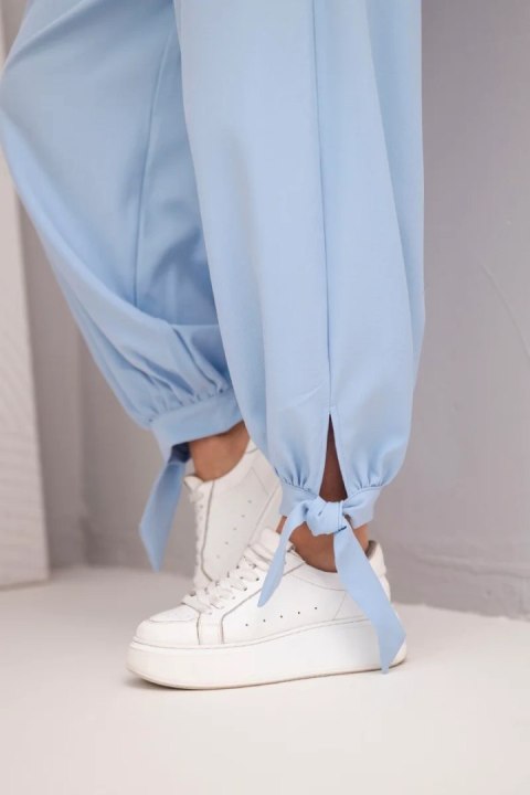 Spodnie damskie z szeroką nogawką i wiązaniem u dołu niebieskie