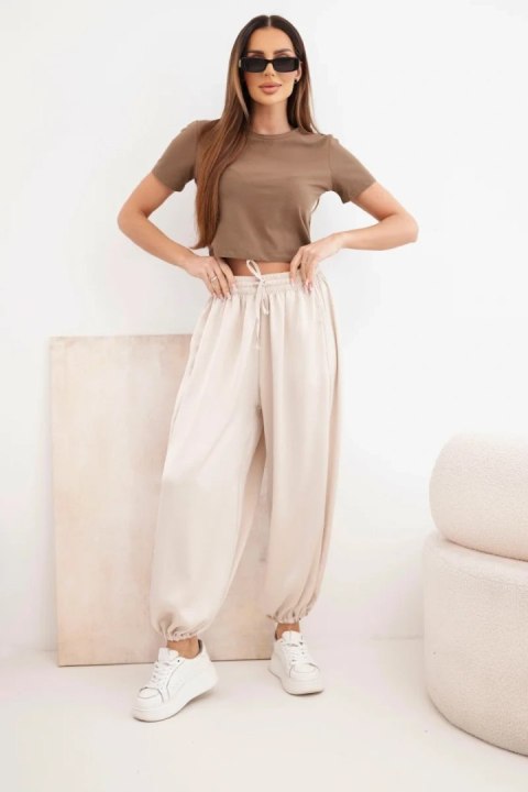 Spodnie damskie szerokie z gumką w pasie i wiązaniem typu alladynki beżowe