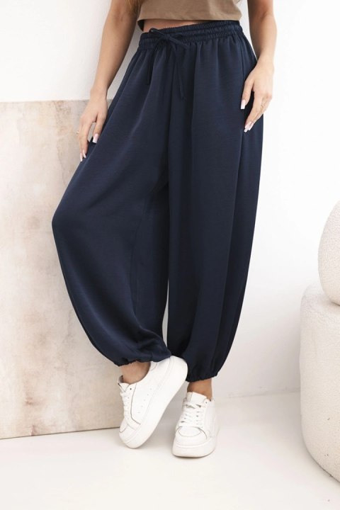 Spodnie damskie szerokie z gumką w pasie i wiązaniem typu alladynki granatowe