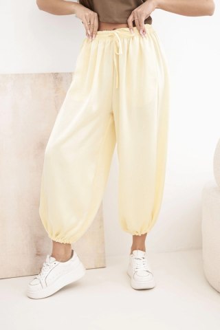 Spodnie damskie szerokie z gumką w pasie i wiązaniem typu alladynki żółte